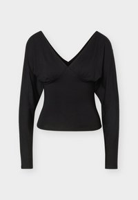 Schwarzes, langärmliges, figurbetontes Oberteil mit tiefem V-Ausschnitt und leichter Raffung unter der Brust, vor einem einfarbigen, hellen Hintergrund präsentiert.