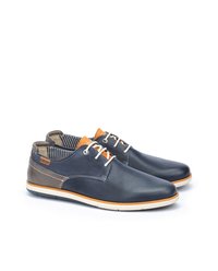 Leather shoes in navy with tan accents, featuring a smooth surface, white laces, and a contrasting striped interior. Lightweight sole.