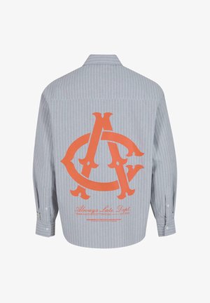 Gestreifte graue Hemd mit orangefarbenem übergroßen Logo auf der Rückseite. Verfügt über lange Ärmel und einen Button-Down-Kragen. Weicher Griff.