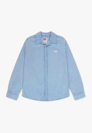 Svetlomodrá košeľa s dlhými rukávmi a gombíkmi z mäkkej bavlnenej tkaniny. Má klasický golier, predné vrecko a zaoblený spodný lem.