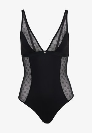 Schwarzer Body mit transparenten Netzeinsätzen in geometrischem Muster, tiefem V-Ausschnitt und dekorativem silbernem Akzent in der vorderen Mitte.