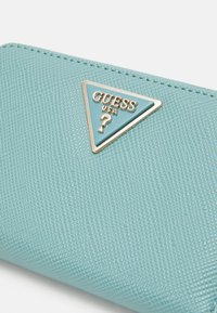 Guess LAUREL MEDIUM ZIP AROUND - Portefeuille - teal