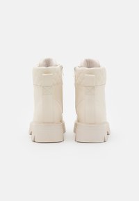 s.Oliver Platform ankle boots - cream