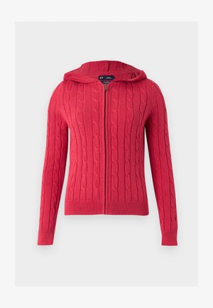 Κόκκινο πλεκτό φούτερ με φερμουάρ, μακριά μανίκια και ριμπ μανσέτες και τελείωμα σε απλό ανοιχτό φόντο.