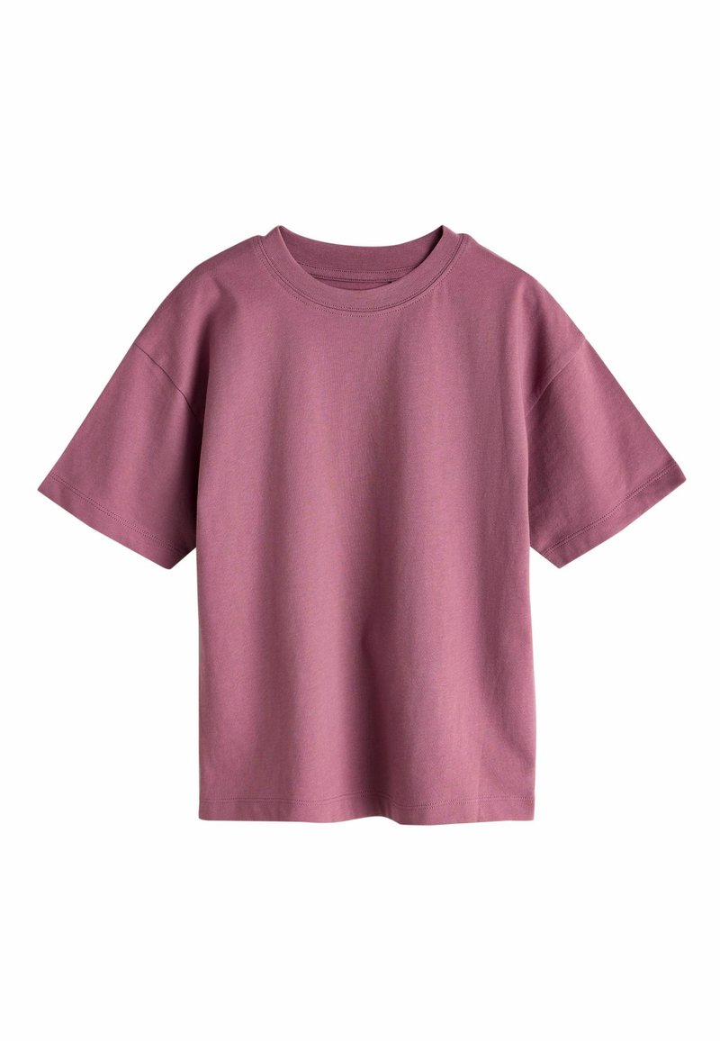 T-shirt a maniche corte in cotone morbido di peso medio. Presenta una scollatura tonda e una vestibilità rilassata nel colore rosa polvere. Senza dettagli grafici.