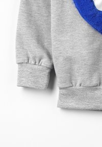 WAUW CAPOW Bluza
