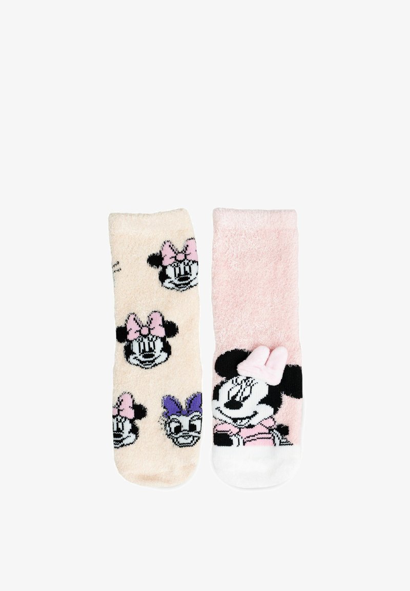 Calze pelose in rosa chiaro e beige. Una calza presenta disegni di Minnie Mouse; l'altra è di un rosa uniforme con una grafica di Minnie e un accento a forma di fiocco.