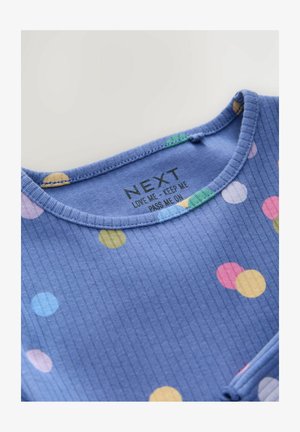 Camicia di cotone blu con texture a coste, con dei puntini multicolori in rosa, giallo, verde e blu. Etichetta stampata sul collo.