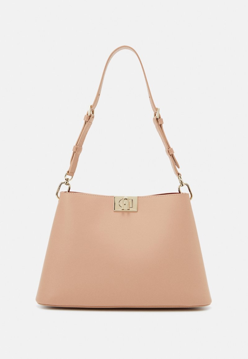 Borsa a tracolla rosa chiaro con forma strutturata, tracolla regolabile e chiusura in metallo dorato sul davanti. Design liscio e minimalista.