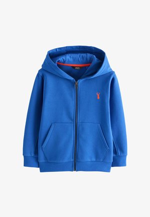 Mėlynas užtraukiamas džemperis su kišenėmis priekyje, siaurėjančiomis rankogaliais, gaubtu ir mažu oranžiniu elnio logotipu ant krūtinės.