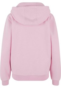 Sudadera con capucha de color rosa claro, mezcla de algodón, con una textura suave, capucha grande, puños acanalados y dobladillo redondeado. Diseño sencillo, sin logotipos visibles.