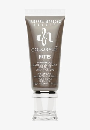 Matte brauner Tubus von Danessa Myricks Beauty ColorFix, wasserfester flüssiger Pigment für Augen, Gesicht und Lippen mit weißem Deckel.