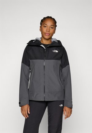 Black and gray two-tone waterproof jacket with a hood, full zipper, and logo on the chest, featuring a smooth texture and modern design.