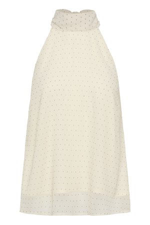 Αμάνικη μπεζ μπλούζα με ψηλό γιακά και μικρές μαύρες πουά, φτιαγμένη από ελαφρύ, ελαφρώς διαφανές ύφασμα.