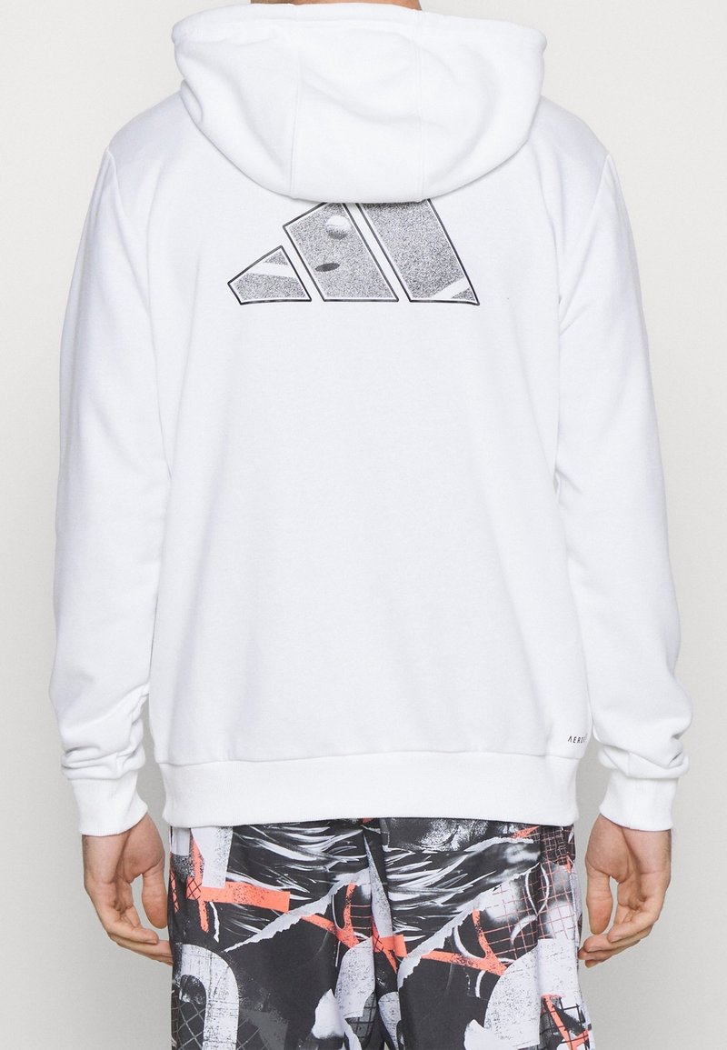 Biała bluza z kapturem z dużym czarnym wzorem na plecach, z prążkowanymi mankietami i dolnym wykończeniem dla dopasowanego wyglądu.