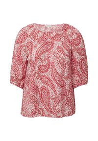 Katoenen blouse met een ronde halslijn, driekwart mouwen met puff, en een roze paisleypatroon op een lichte achtergrond. De textuur is licht gekreukt.