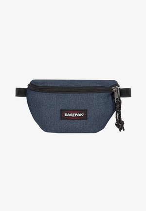 Kompakti tummansininen Eastpak-vyölaukku mustalla vetoketjulla ja säädettävällä olkaremillä, jossa on etuosassa logopatch.