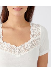 Damart MANCHES COURTES DOUCEUR THERMOLACTYL - Maglietta intima - blanc