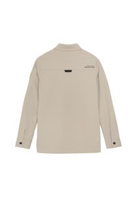 Beige lange mouwen overhemd met een kraag, textuurstof, knoopmanchetten en bedrukte branding op de rug nabij de halslijn.