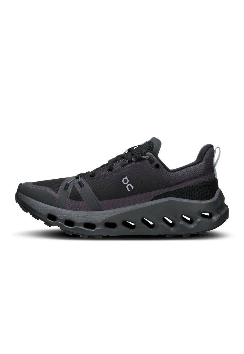 Black and gray athletic shoe with a textured upper, streamlined design, prominent cushioning sole, and side ventilation cutouts.