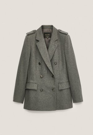 Blazer en laine gris à double boutonnage avec revers crantés, six boutons, épaulettes et deux poches à rabat à l'avant.