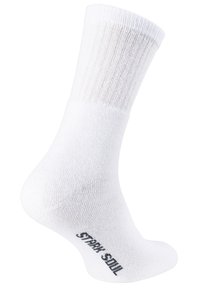 Chaussette en coton blanc avec une texture côtelée et un talon renforcé, comportant l'inscription "Restez immobile" imprimée en noir sur le dessous.