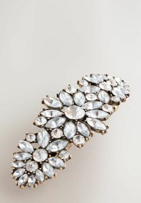 Agrafă decorativă de culoare aurie cu multiple cristale clare, fatetate, aranjate în modele florale.