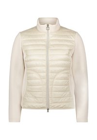 Lekka, kremowa kurtka z pikowanym przodem, gładkimi rękawami, wysokim kołnierzem i centralnym zamkiem. Posiada kieszenie po bokach i dopasowaną sylwetkę.
