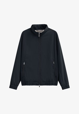 Navy windbreaker jacket with a high collar, zippered front, elastic cuffs, and two side pockets; made from smooth, lightweight fabric.