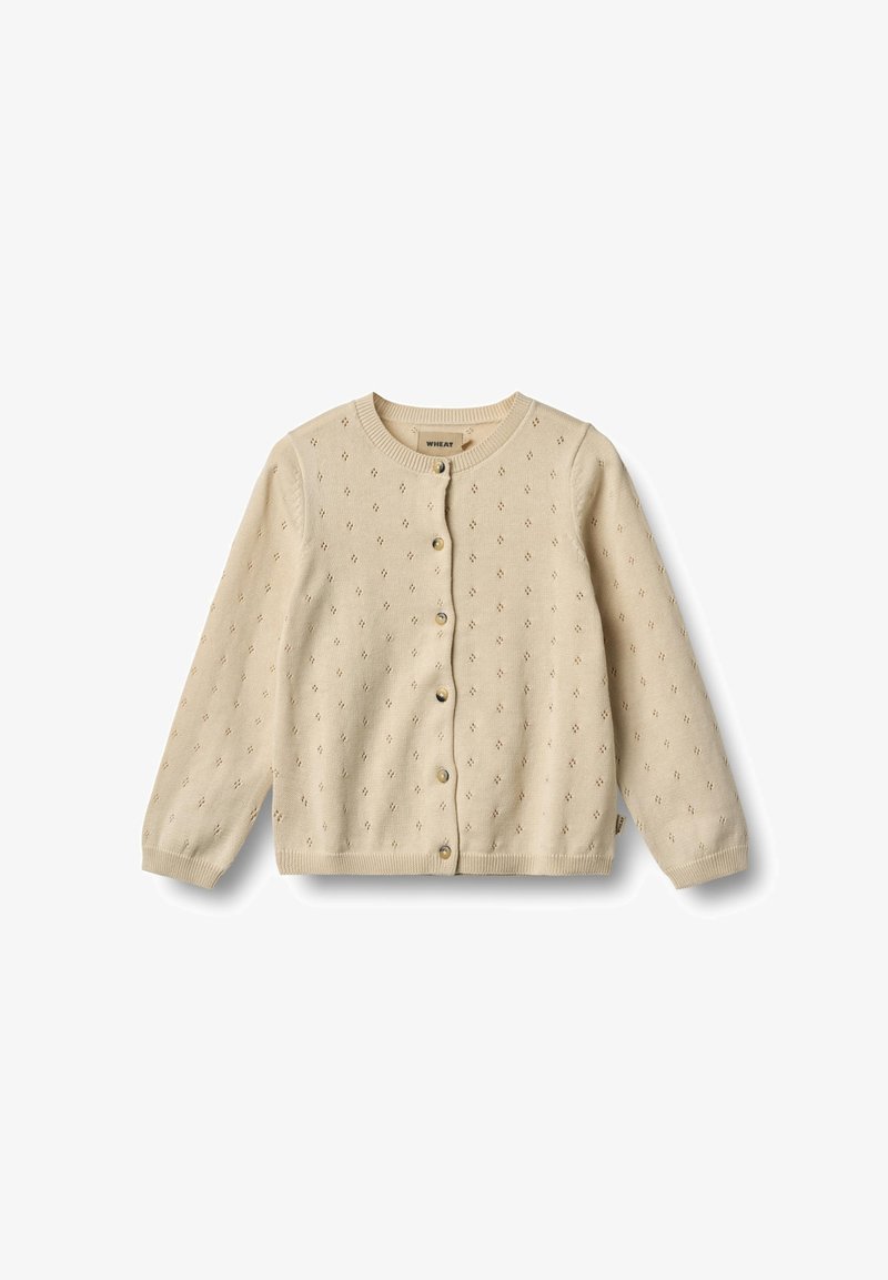 Cardigan en tricot beige avec encolure ronde, manches longues et fermeture à boutons. Présente un motif texturé et de simples boutons dorés.