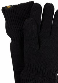 Zwarte gebreide handschoenen met geribde manchetten, gemaakt van een textuur gebreid materiaal. Voorzien van een klein merklabel op een manchette.