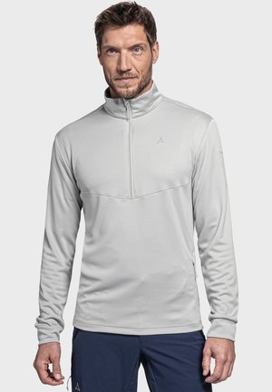 Helles grauer Pullover mit halbem Reißverschluss, langen Ärmeln, strukturiertem Stoff und dezentem Branding. Verfügt über einen Stehkragen und elastische Bündchen.
