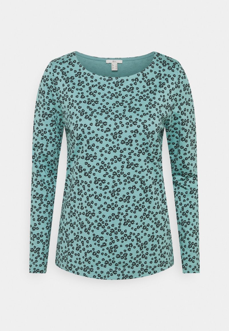 Turquoise lange mouwen top van zacht materiaal, met een zwart bloemenpatroon over de hele stof en een ronde halslijn.