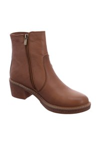 Braunes Lederknöchelboot mit leicht abgerundetem Zeh, seitlichem Reißverschluss und niedrigem Blockabsatz. Gestickte Akzente betonen das Design.