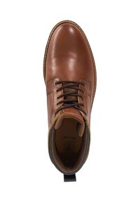 Brown leather ankle boot with round toe, lace-up design, and padded collar. Features contrasting stitching and a pull tab at the heel.