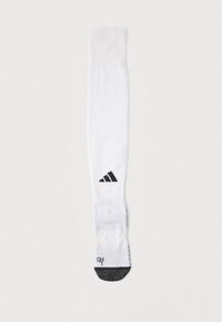 Fehér térdig érő zokni fekete Adidas logóval, a lábujjnál texturált szürke betéttel. Puha, rugalmas anyag a kényelemért.