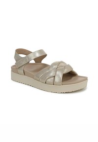 Gouden, gevlochten band sandals met een beige, dikke zool. Beschikt over twee verstelbare banden en een gestructureerde afwerking. Ideaal voor comfort en ondersteuning.