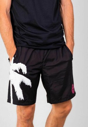 Pantalones cortos de baño negros con un gráfico de palmera blanca en el lado izquierdo, cintura elástica y un logo con acento rosa en la parte inferior derecha.