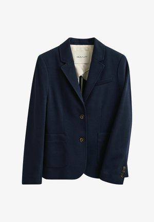 Marineblauer maßgeschneiderter Blazer mit zwei vorderen Knöpfen, zwei aufgesetzten Taschen unten, einer Brusttasche mit Paspelierung und Revers mit Kerbe.