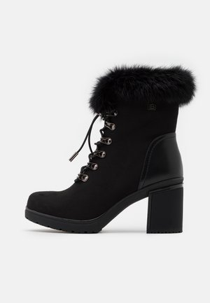 Enkellaarsjes met plateauzool - black