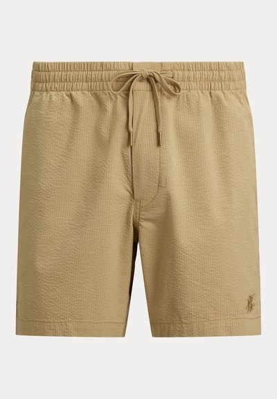 Μπεζ ανδρικό μαγιό σορτς με υφή υφάσματος, ελαστική μέση, ρυθμιζόμενο κορδόνι με μεταλλικές άκρες και μικρό κεντημένο λογότυπο στο κάτω μέρος.