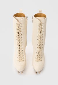 Sandales à talons en cuir à clous noires Dsquared2, €1.399 |  | France