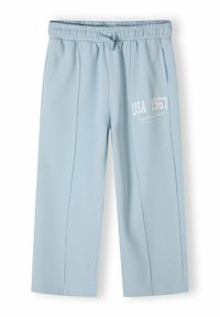 Ljusblå sweatpants med resårmidja, prydda med vit text "USA 1967" och fickor på sidorna. Mjuk tyg, rak passform.