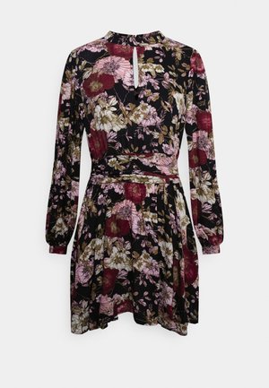 Robe noire à manches longues avec imprimé floral bordeaux, rose et blanc, encolure en trou de serrure, taille cintrée et jupe fluide.