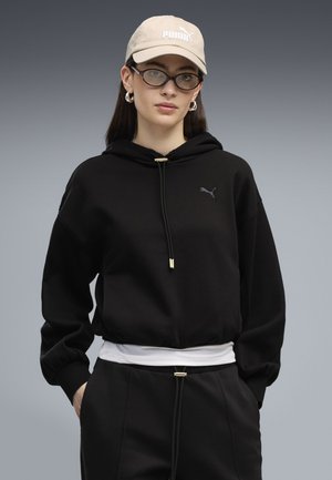 Puma, HER RELAXED FLEECE HOODIE - Kapuzenpullover - black