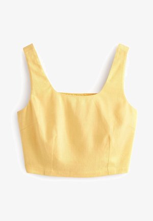 Haut court jaune sans manches avec larges bretelles et encolure carrée, fabriqué en tissu texturé.