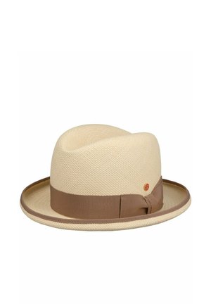 Cream-colored fedora hat with a brown ribbon band and a small round badge on the side, set against a plain white background.