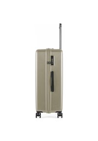Valise à coque rigide de couleur beige clair, équipée d'une poignée sur le côté, d'une fermeture à glissière, d'un verrouillage par combinaison intégré et de quatre roulettes doubles.
