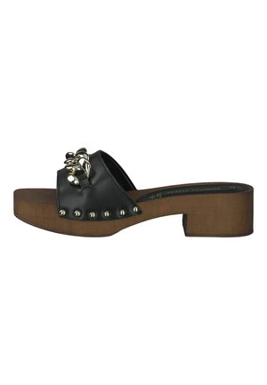 Black leather slide sandal with decorative metallic accents, wooden block heel, open toe, and studded detailing along the front.