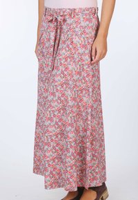 Maxi-Rock aus leichtem Stoff mit einem mehrfarbigen Blumenmuster, mit einer Kordelzug taille und seitlichen Taschen. Fließende und entspannte Passform.